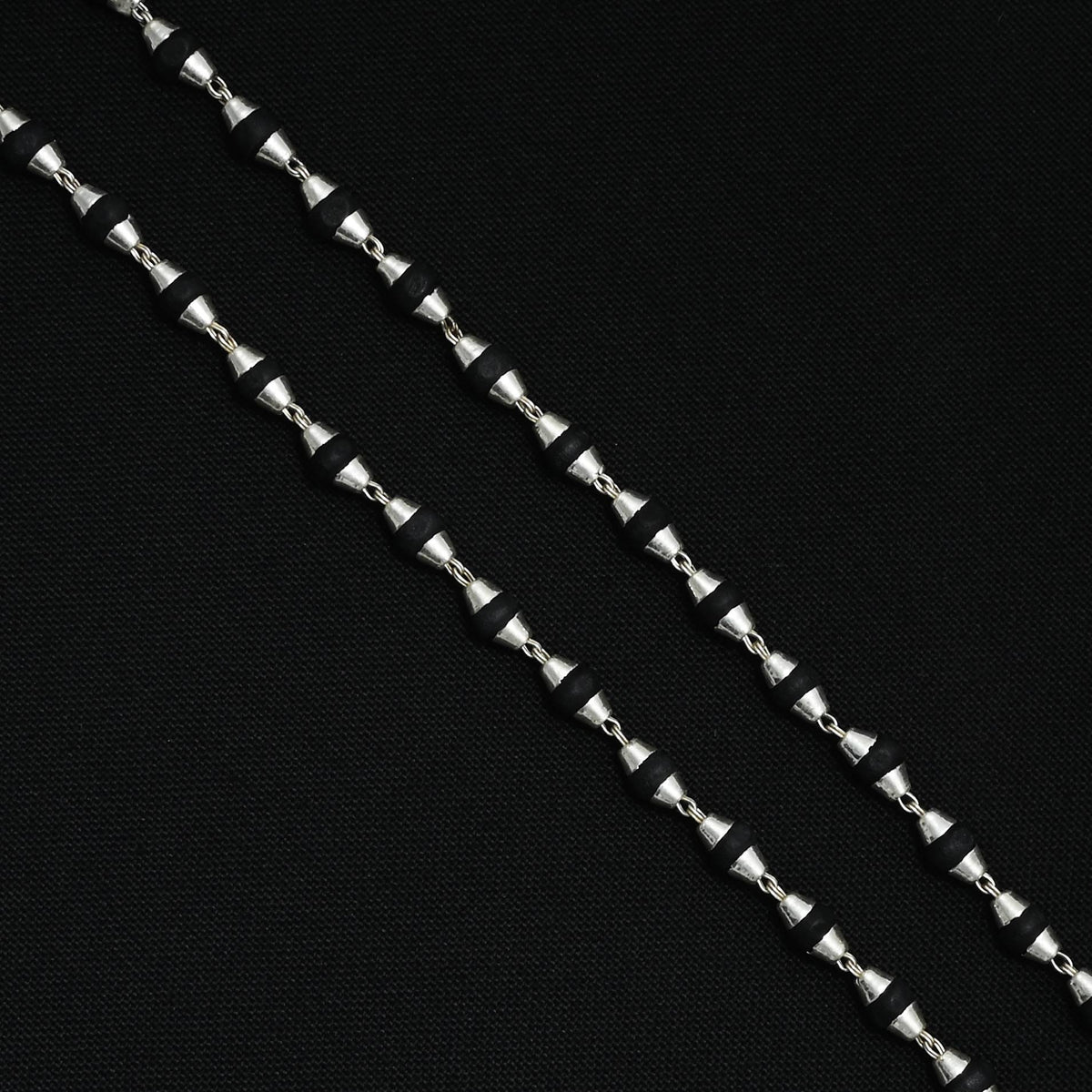 Engraved silver Tulsi mala, crafted for devotion and positive energy in your spiritual journey.