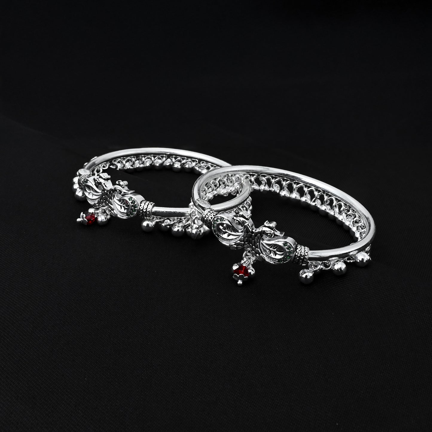 Elegant silver kada payal with intricate peacock design and ghungroo