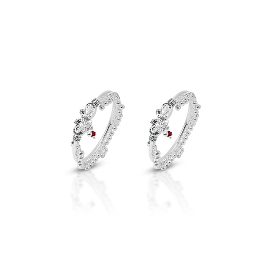 Silver payal featuring a peacock motif and ghungroo