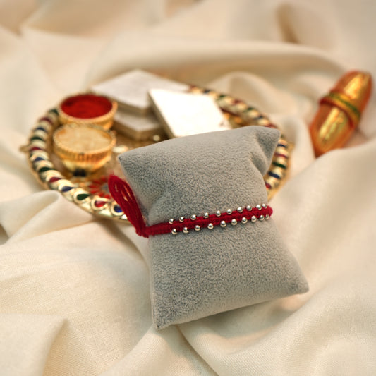 Unique Silver Rakhi with Bud Details