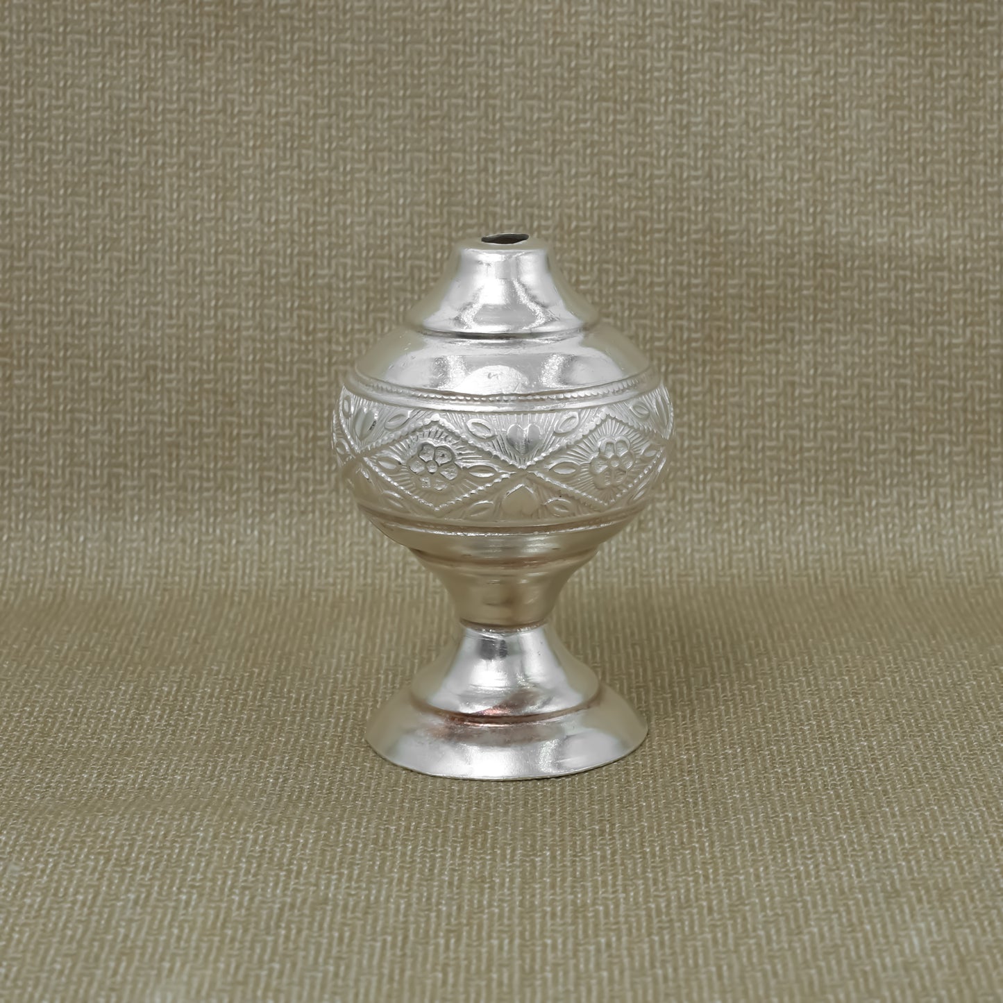 Exquisite silver agarbatti stand, ideal for holding incense during pooja and creating a peaceful atmosphere.