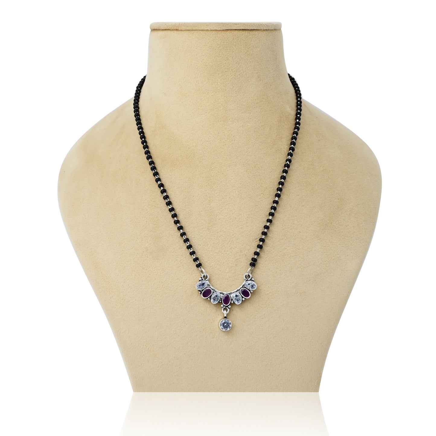 Sterling silver mangalsutra featuring a charming bow design with a purple gemstone centerpiece