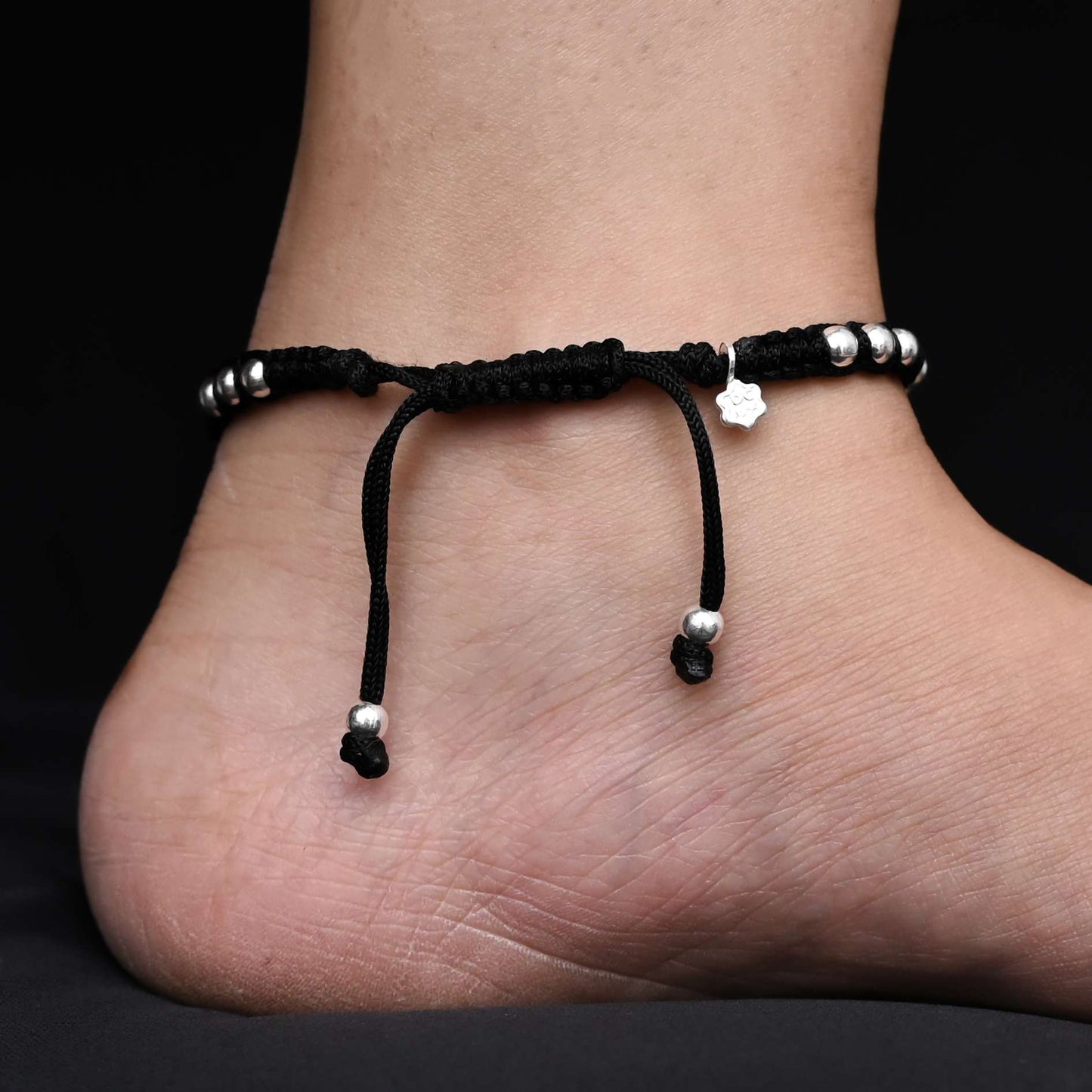 Dhaga payal with silver heart, peacock, and multi-color stones.