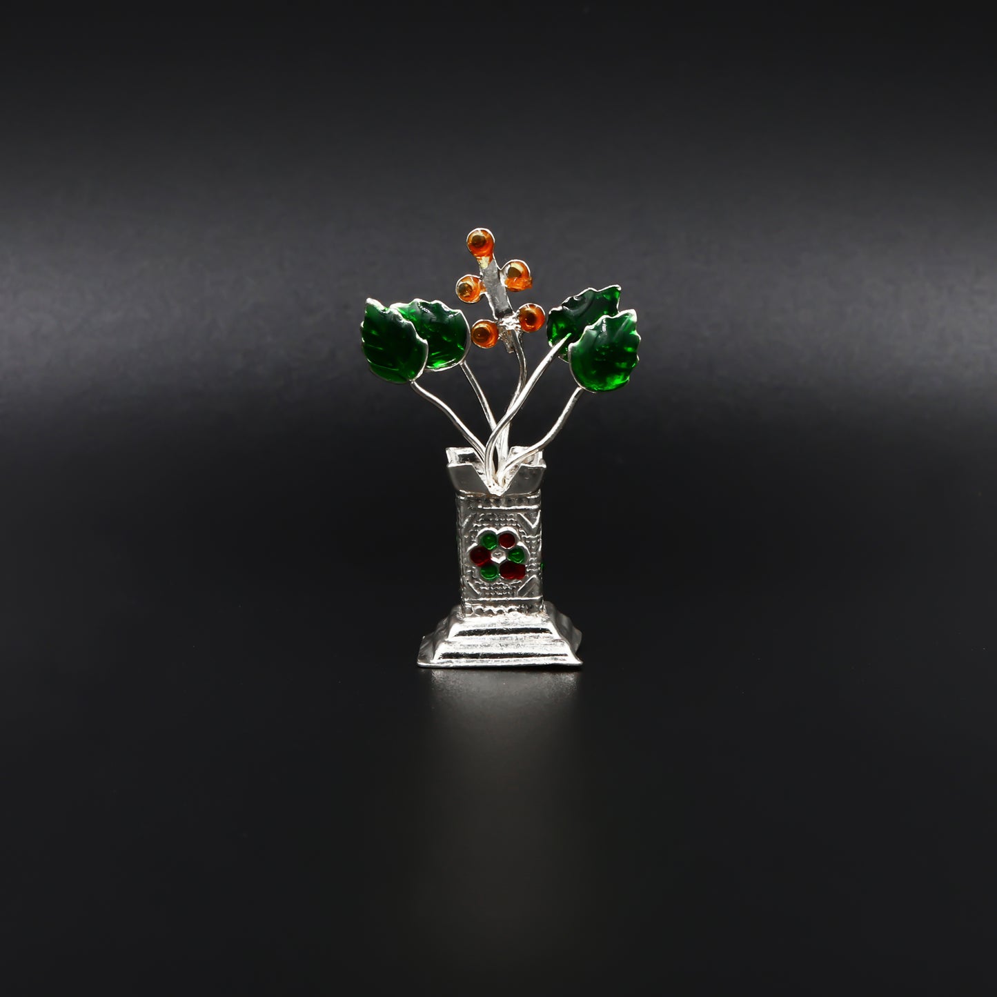 Premium silver Tulsi plant, designed to bring elegance and positive vibes into your home or temple