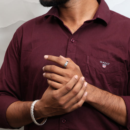 Men’s silver ring with sleek gemstone accent