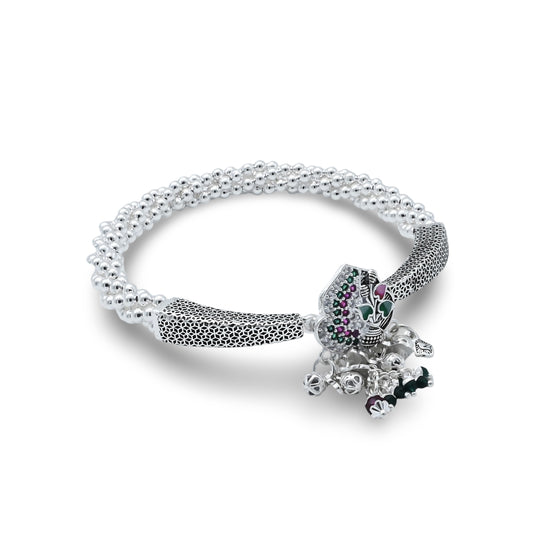 Elegant silver kada payal featuring ghungroos, perfect for traditional occasions.