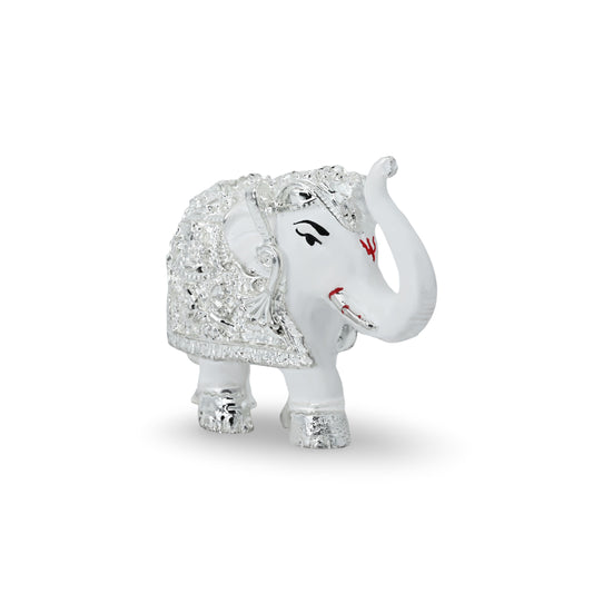 Handcrafted silver-coated elephant statue with wax detailing, symbolizing strength and good luck.