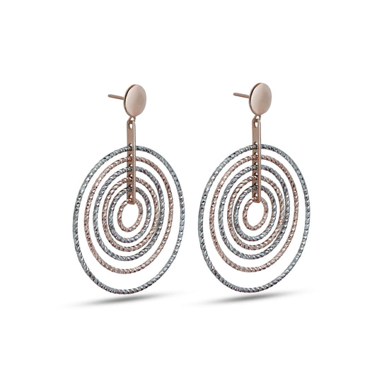 Stylish silver drop earrings featuring a minimalist multi-ring design.