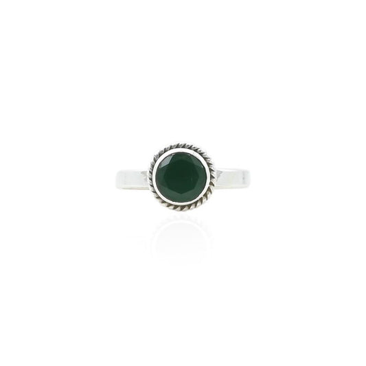 Silver ring featuring a classy green round gemstone, offering a sophisticated and vibrant touch.