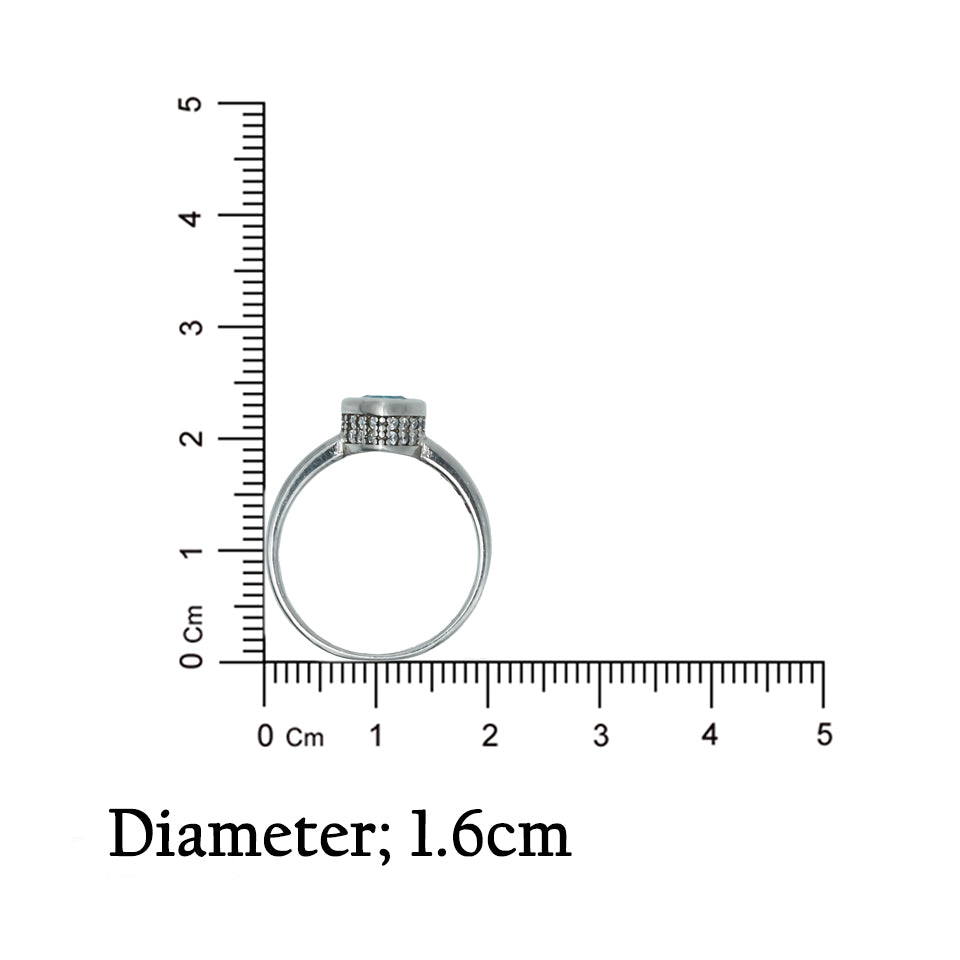 Sophisticated silver ring featuring blue topaz heart, perfect for young women.