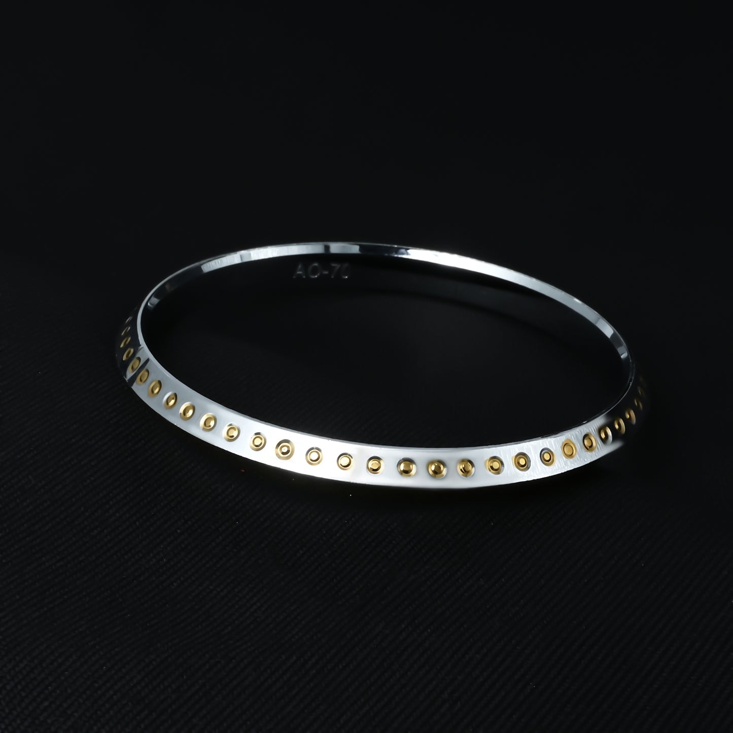 Gold plated silver kada featuring minimalist engraved details