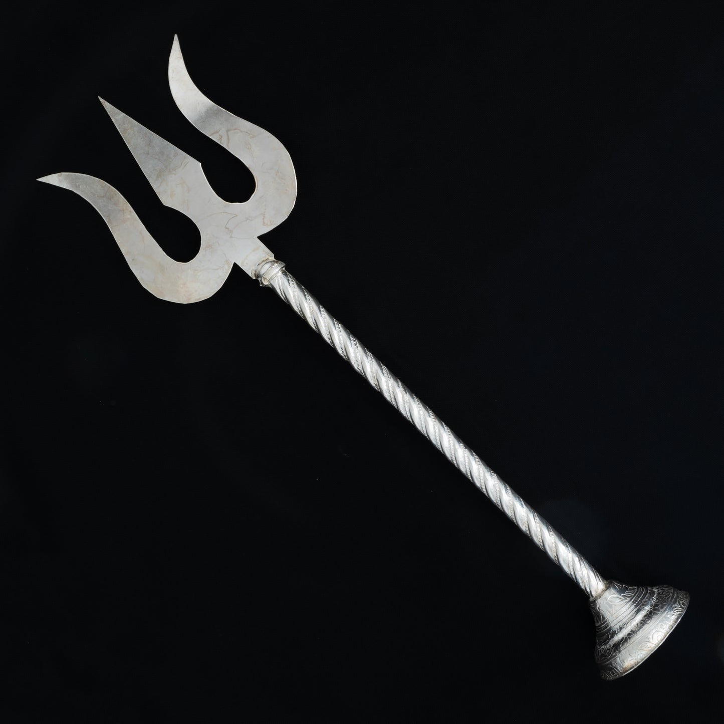 Intricate silver trishul, perfect for enhancing your spiritual space and home decor.