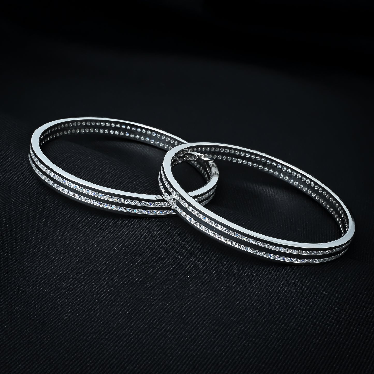 Elegant silver bangles with white stones