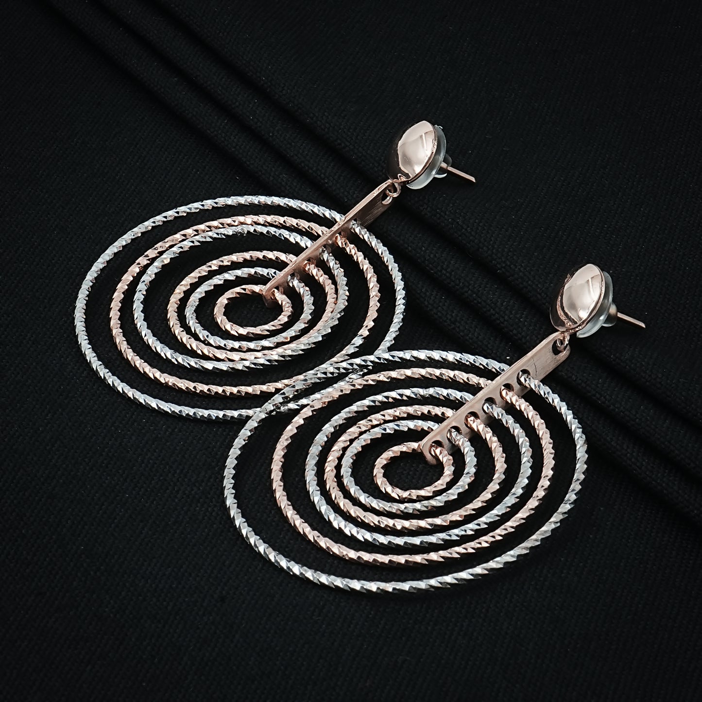 Elegant silver earrings with a multi-ring drop style