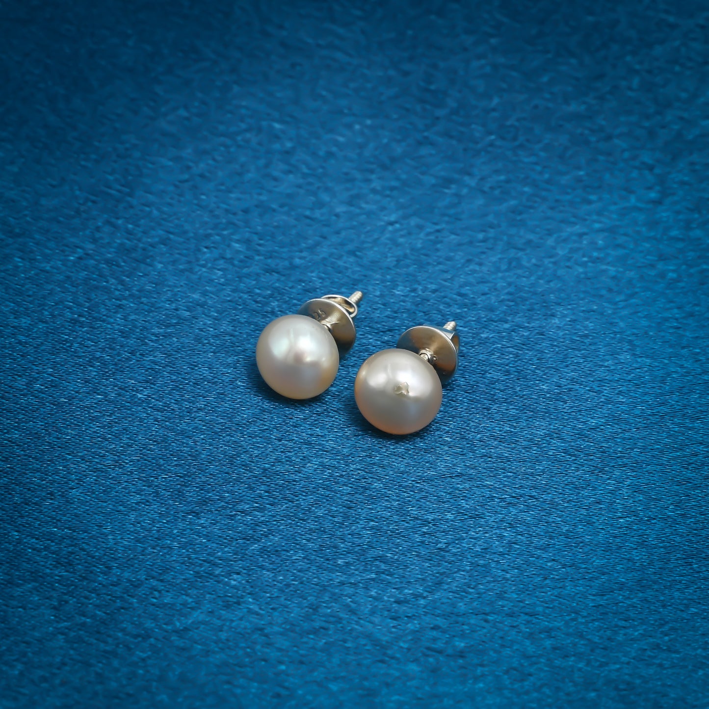 Chic silver earrings with rich brown pearl studs