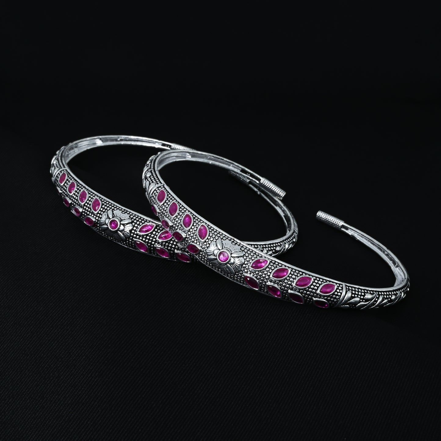 Center flower design silver payal adorned with multiple purple stones