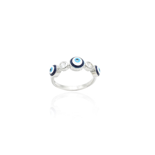 Close-up of a silver ring with a subtle evil eye motif, combining delicate craftsmanship with a meaningful symbol.