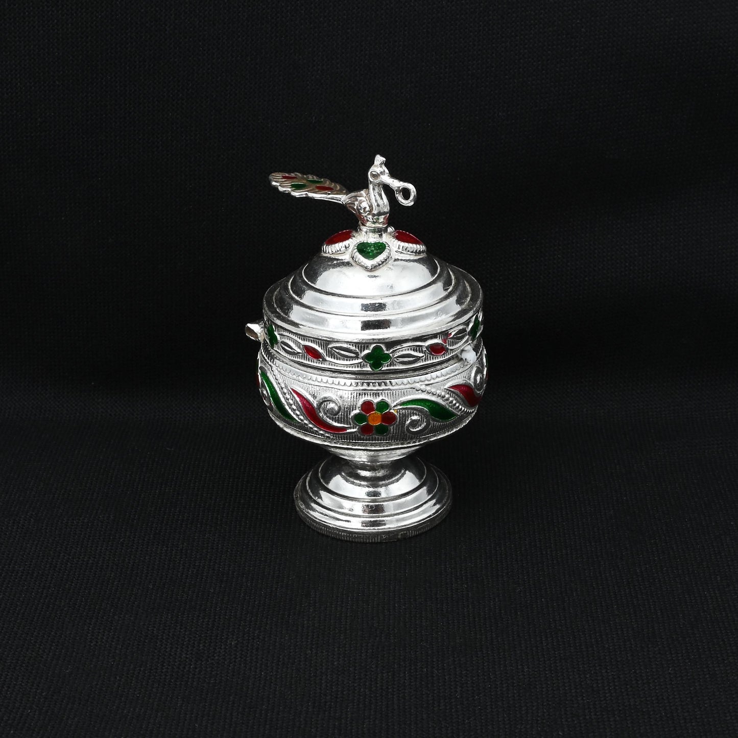 Traditional silver Sindoor box for brides, perfect for spiritual ceremonies