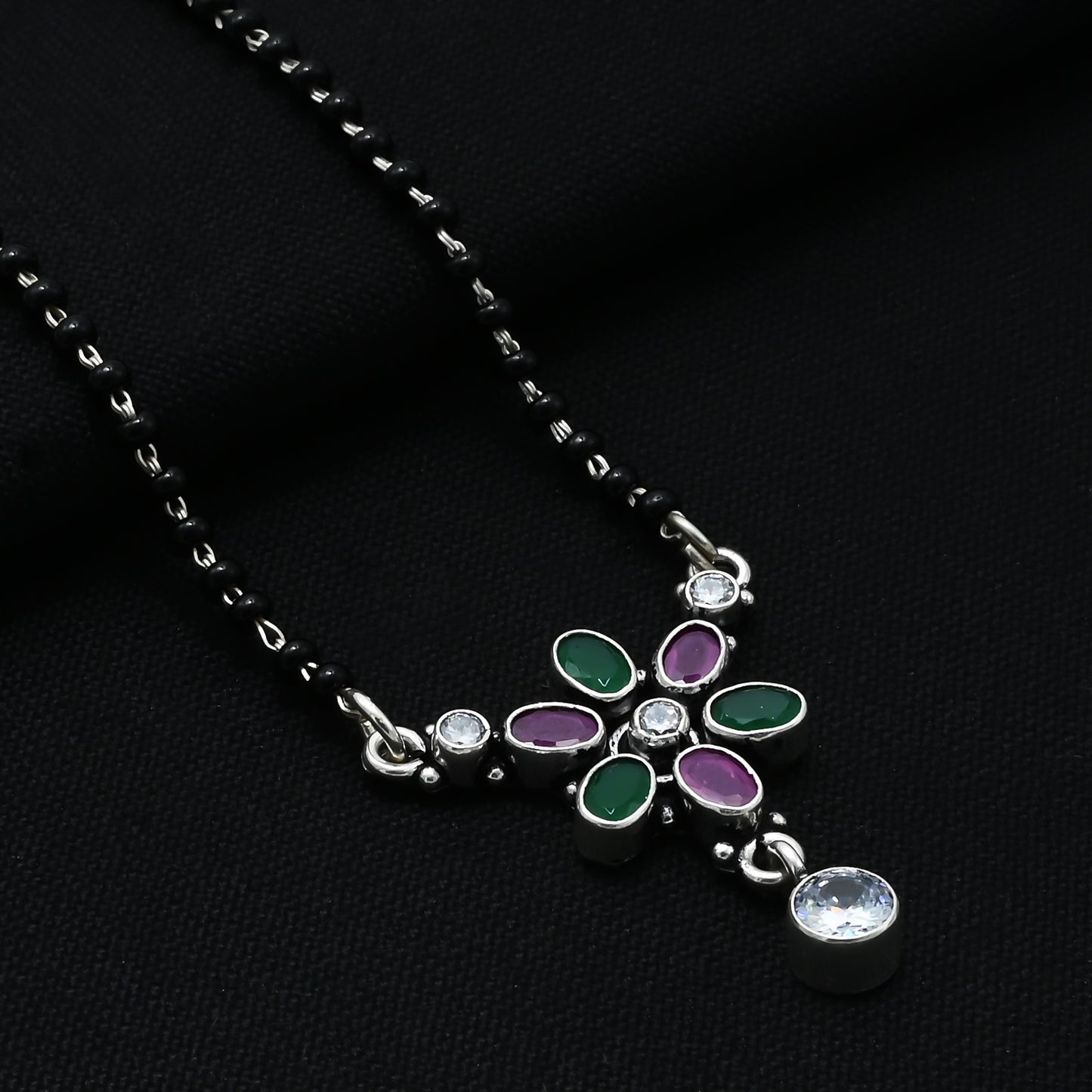 Chic sterling silver mangalsutra adorned with round purple and green gemstones for a sophisticated touch