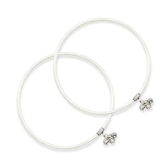 Elegant silver kada anklet with traditional charm accents for a timeless appeal.