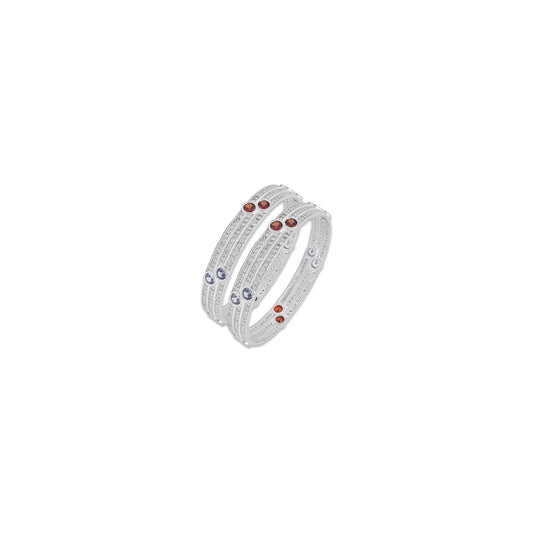 Elegant silver bangles featuring shimmering multicolor stones, designed to bring a colorful and chic accent to your outfit.