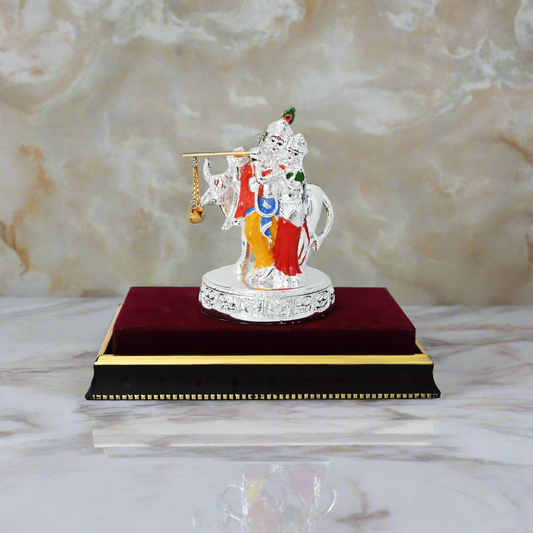 Elegant silver-plated RadhaKrishna idol with wax finish, symbolizing divine love and harmony