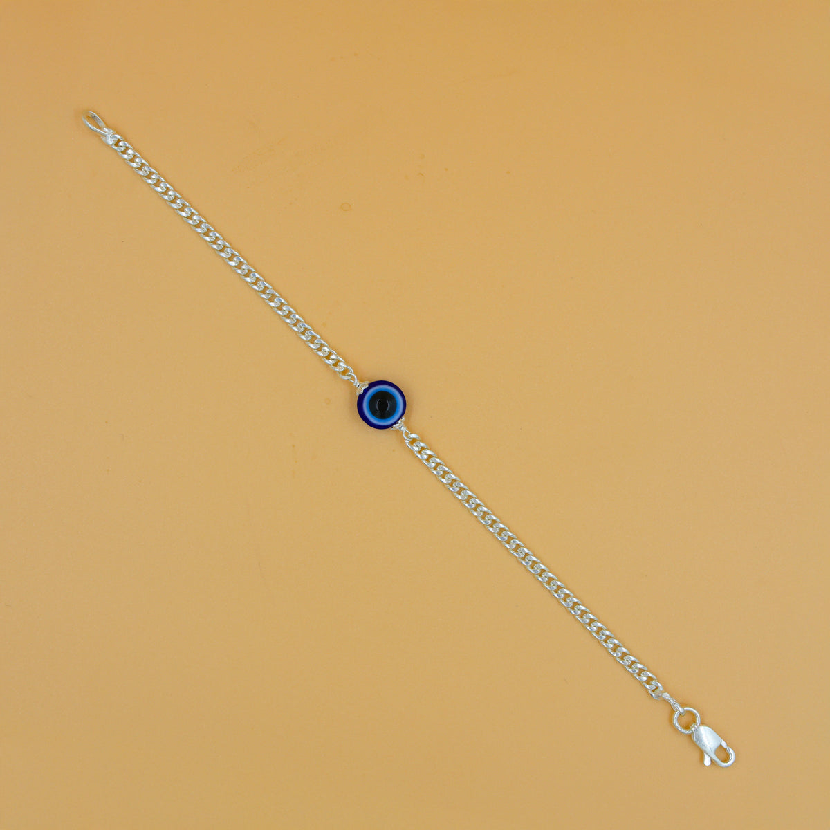 Trendy silver evil eye bracelet designed for both fashion and protection
