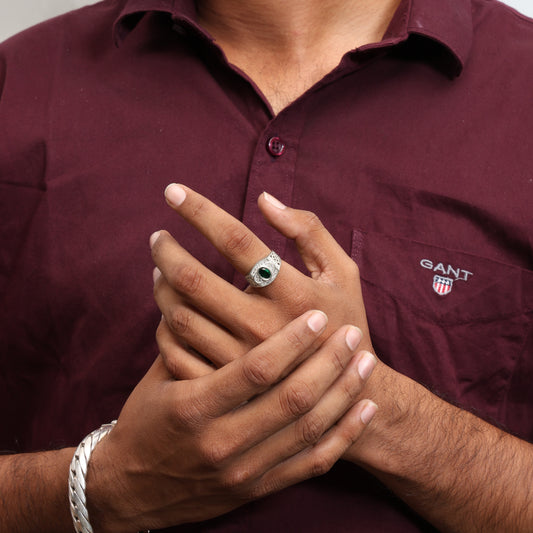 Boys' silver ring with green center gem