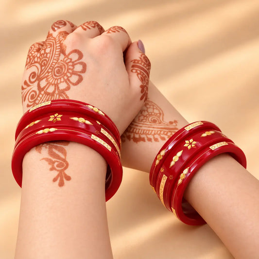 Red Gold Bangle Set Featuring Swastika Design – Stylish & Cultural.