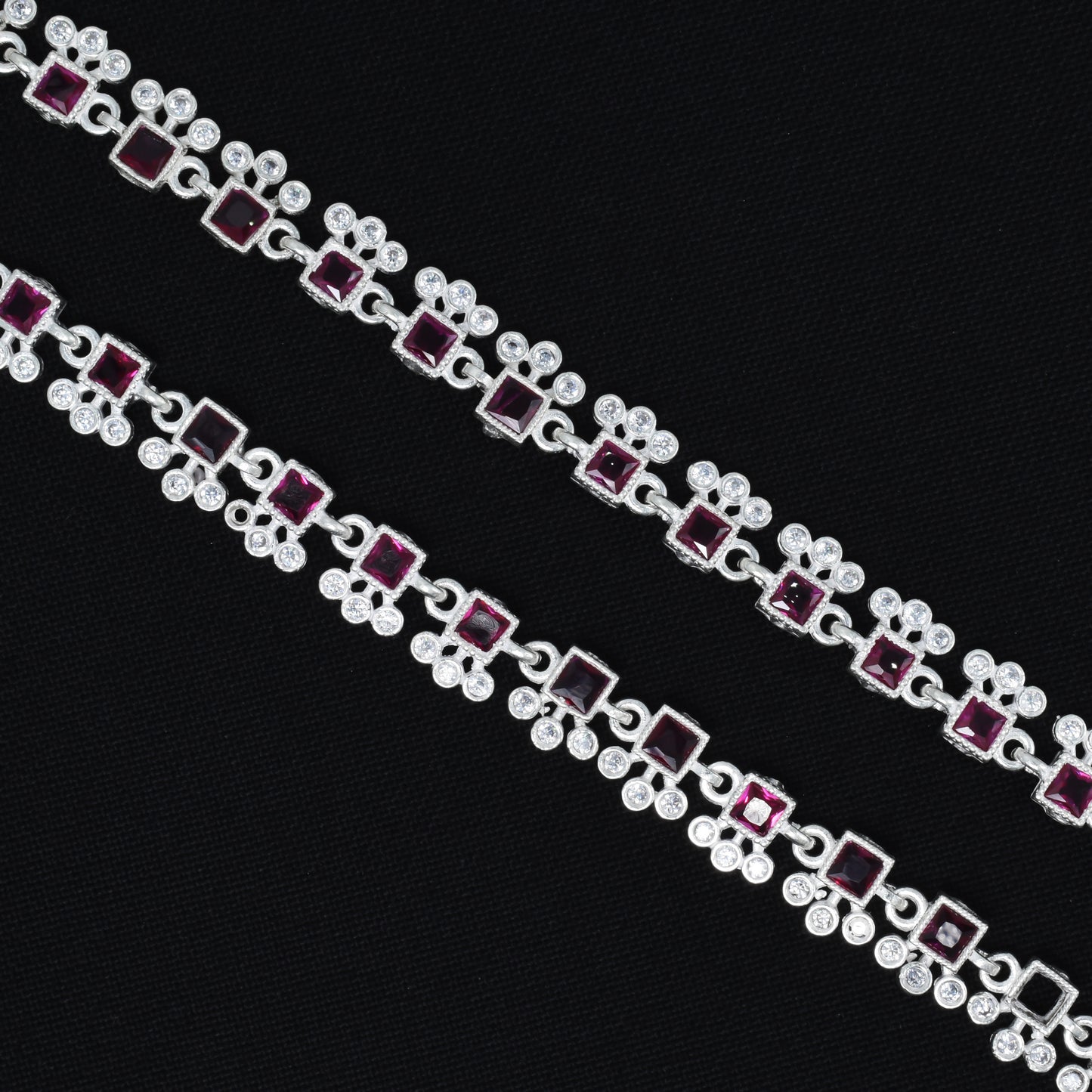 Silver payal with a striking square purple gemstone accent