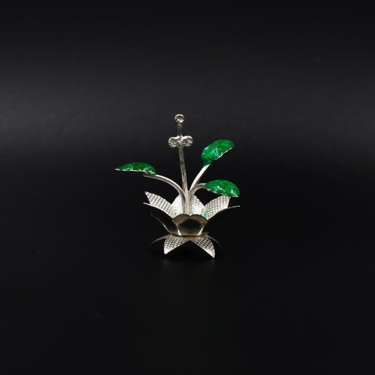 Handcrafted silver Tulsi plant, symbolizing peace and serenity, ideal for enhancing any spiritual space.