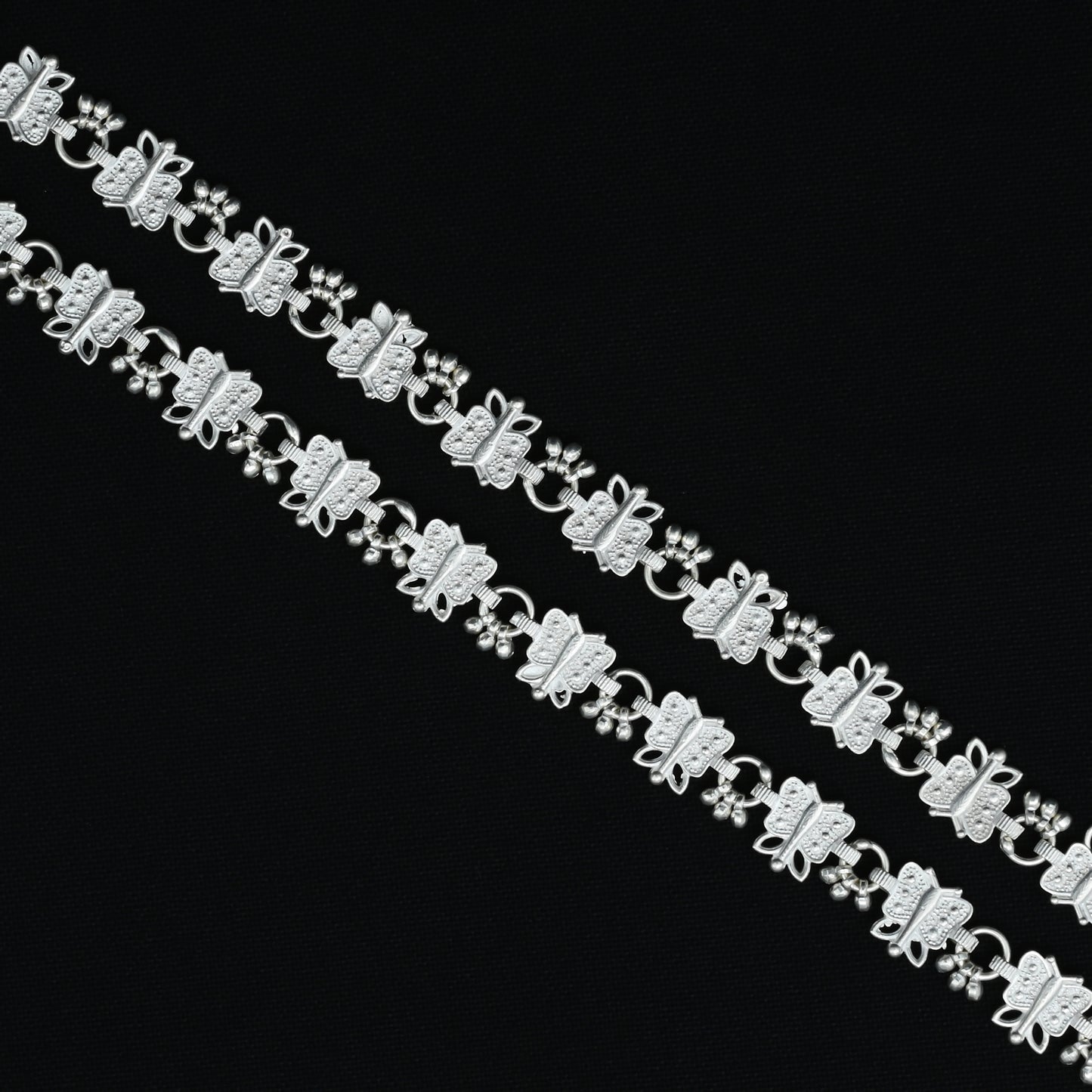 Sterling silver payal with a unique butterfly design, offering a stylish and timeless accessory.