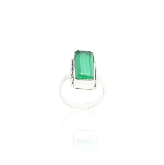 Elegant silver ring with a bold rectangular green gemstone.