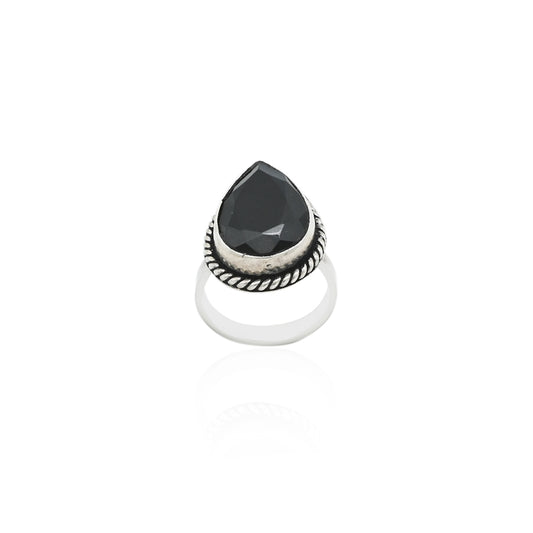 Elegant silver ring with a black stone, offering a sleek and timeless design