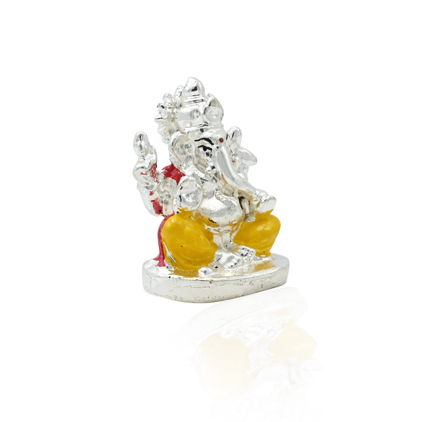 Handcrafted silver statue of Lord Ganesh and Goddess Parvati for spiritual spaces.