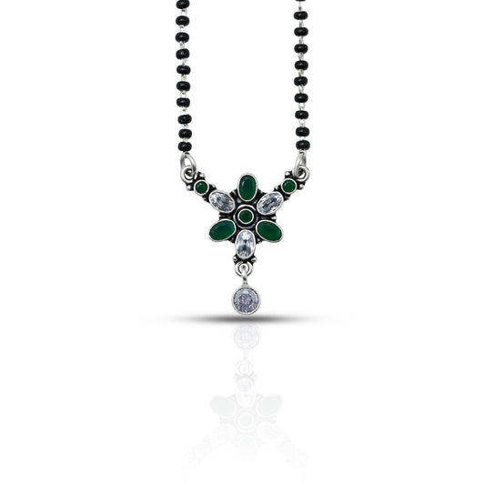 Elegant sterling silver mangalsutra with a combination of round and oval green gemstones