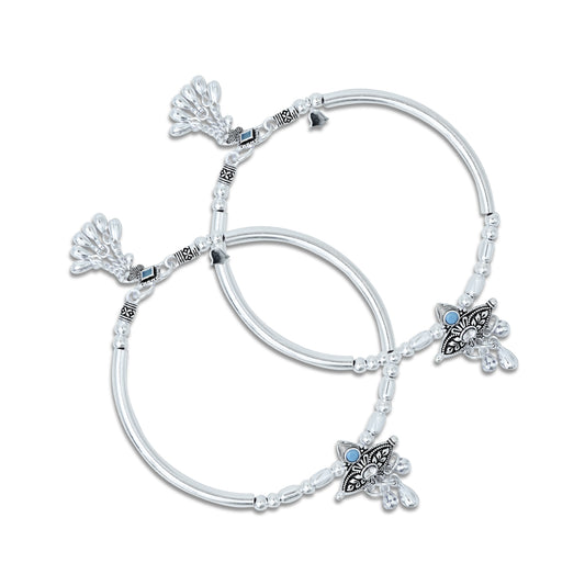 Elegant silver kada anklet for girls, adorned with blue gemstones, silver beads, and ghungroo details.