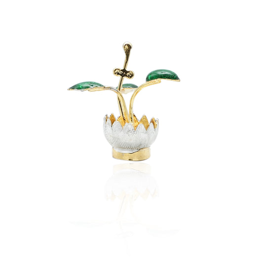 Elegant silver Tulsi plant with a golden hue, symbolizing prosperity and devotion