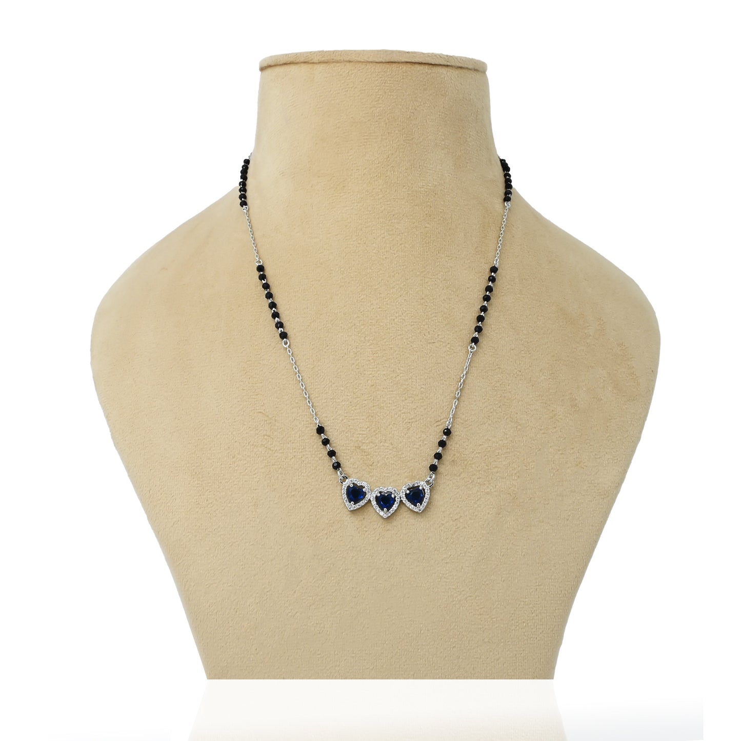 Sterling silver mangalsutra for girls featuring three heart-shaped blue stones at the center