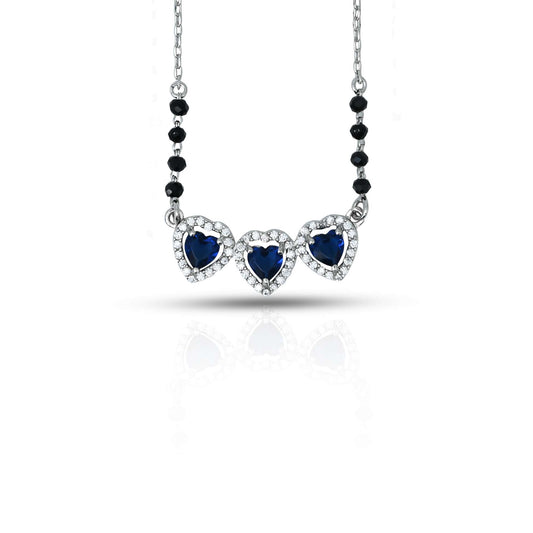 Elegant sterling silver mangalsutra with three heart-shaped blue gemstones for a romantic look