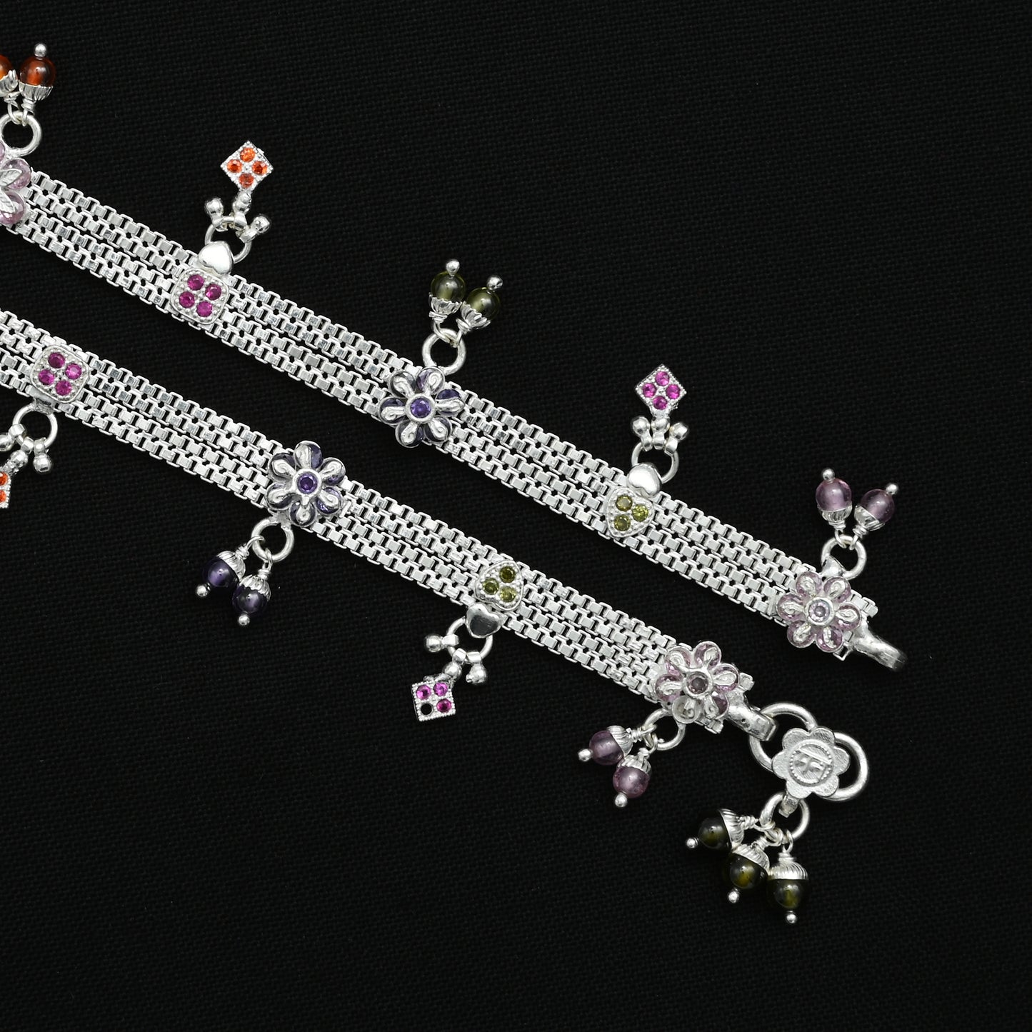Silver anklet with rich, colorful beads and sophisticated designs