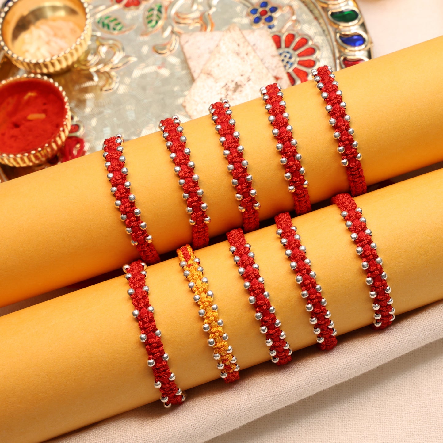 Unique Silver Rakhi with Bud Details