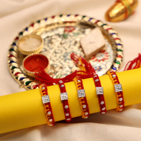 Swastik Glow Silver Rakhi Edition