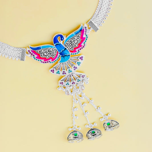 Silver payal with intricate pag phool motif and bold peacock center accent.