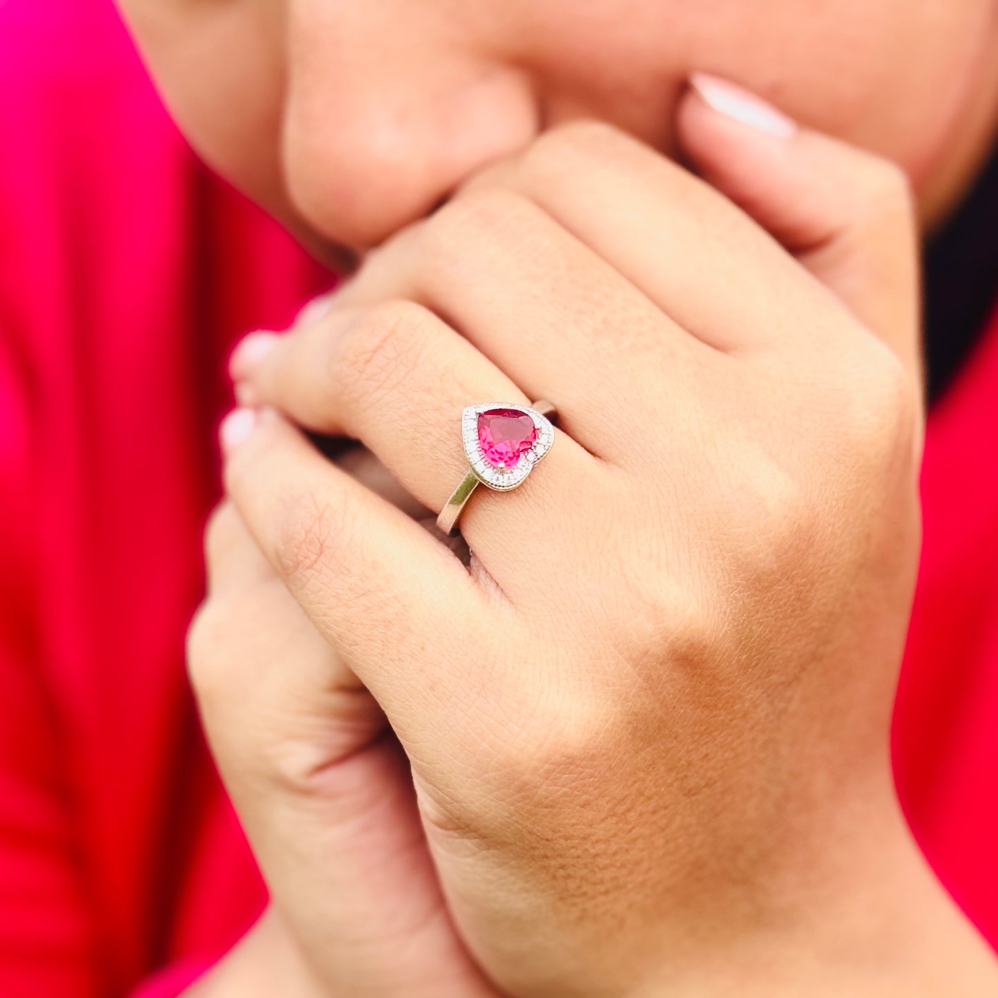 Silver Heart-Shaped Ring with Pink Heart Stone Center.