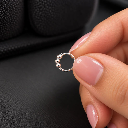 Silver Hoop Nose Ring with Triple Ball Bead Design