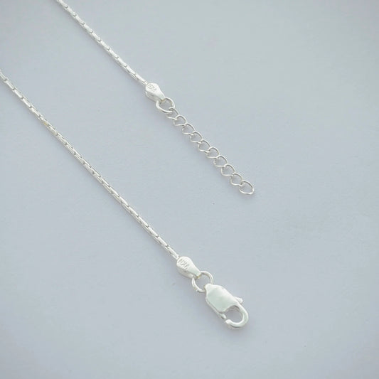 Silver Anklet with Black Cylindrical Moti and Multi-Design Beads.