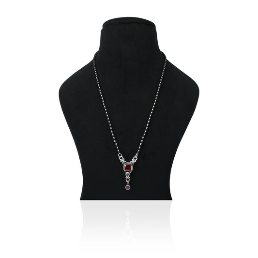 Elegant silver mangalsutra featuring a beautiful square red stone for a bold look