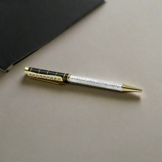 Silver pen with a gold polish and sleek black design