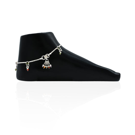 Elegant silver anklet adorned with a mix of soft, colourful gems for a charming look.